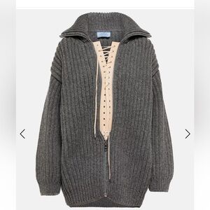 PRADA
Ribbed-knit zipped cardigan